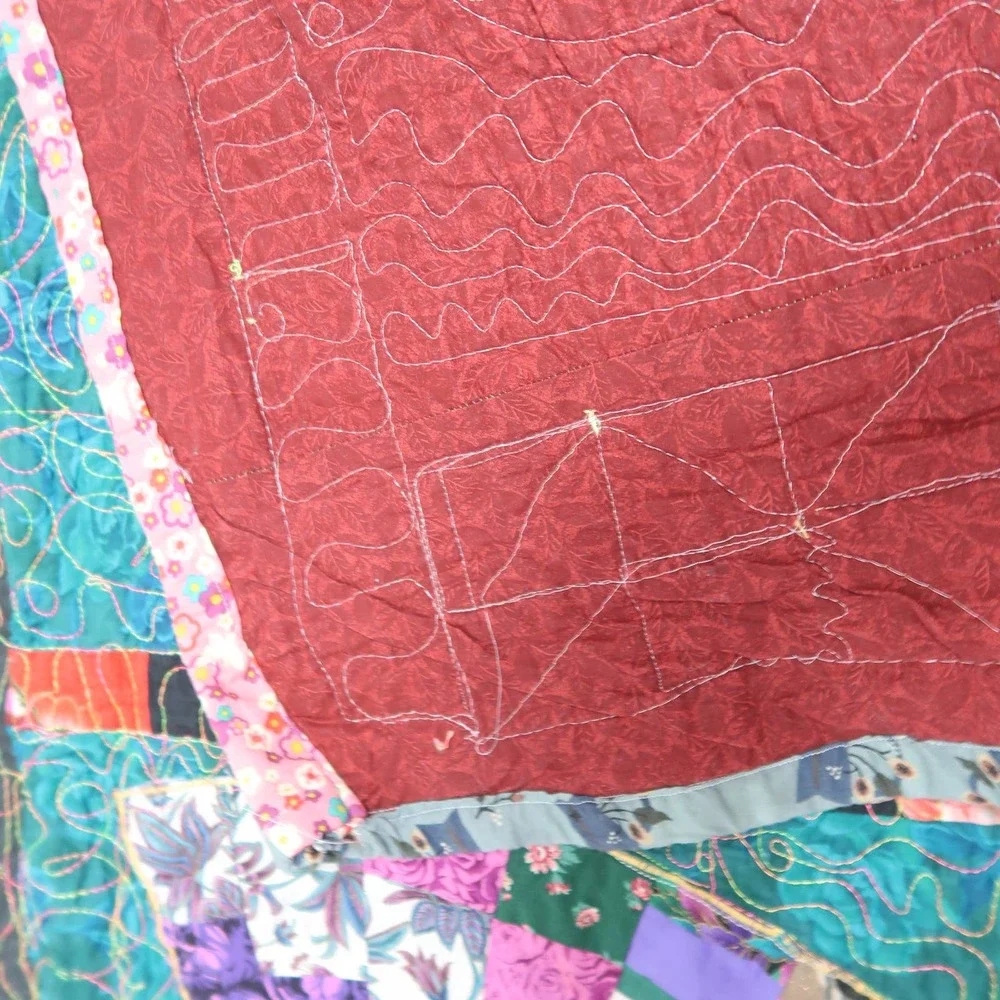 Vintage teal blue and pink oriental fan design quilt blanket with tassel